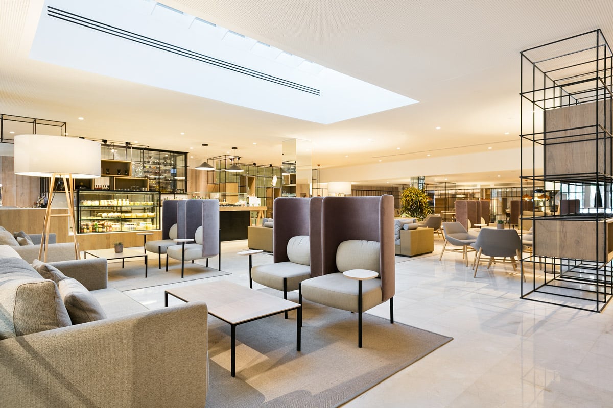 Contemporary seating area with natural light and stylish decor.